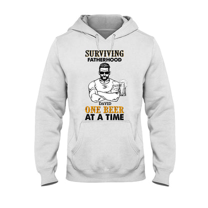 Surviving Fatherhood One Beer At A Time - Personalized Father's Day T-shirt and Hoodie