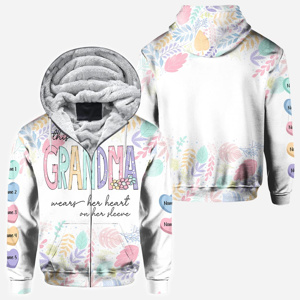 This Grandma Wears Her Heart On Her Sleeve - Personalized Grandma All Over T-shirt And Hoodie