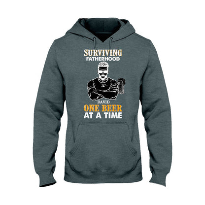Surviving Fatherhood One Beer At A Time - Personalized Father's Day T-shirt and Hoodie