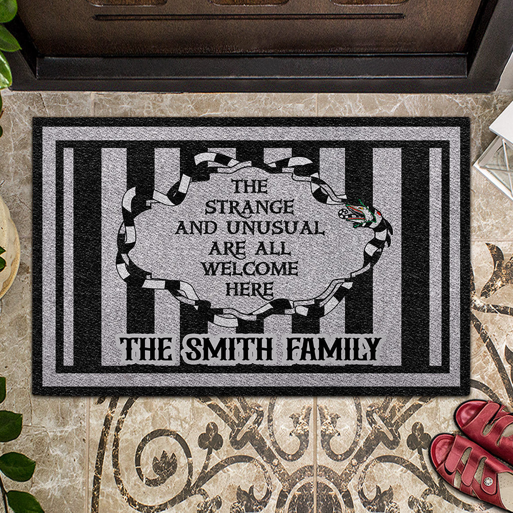 The Strange And Unusual Are Welcome Here - Personalized Doormat