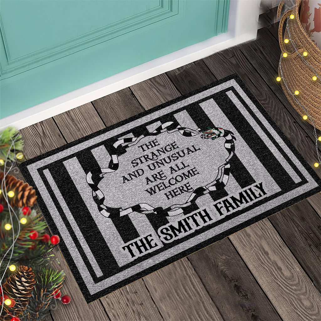 The Strange And Unusual Are Welcome Here - Personalized Doormat