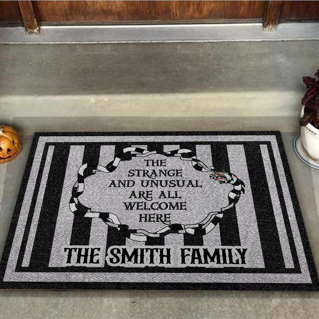 The Strange And Unusual Are Welcome Here - Personalized Doormat