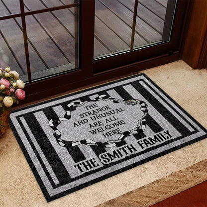 The Strange And Unusual Are Welcome Here - Personalized Doormat
